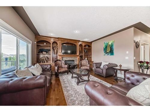 550 Marina Drive, Chestermere, AB - Indoor Photo Showing Living Room With Fireplace