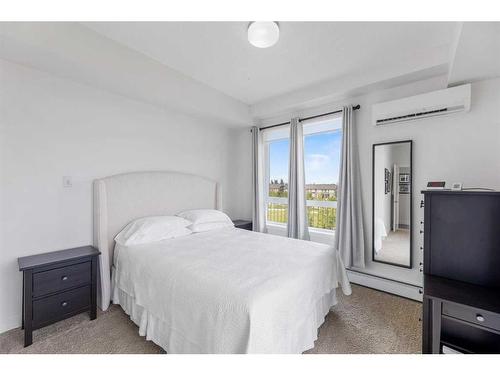 2311-175 Silverado Boulevard Sw, Calgary, AB - Indoor Photo Showing Bedroom