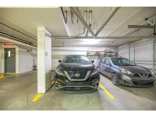 2311-175 Silverado Boulevard Sw, Calgary, AB - Indoor Photo Showing Garage