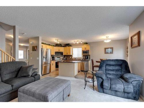 219-371 Marina Drive, Chestermere, AB - Indoor Photo Showing Living Room