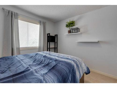 219-371 Marina Drive, Chestermere, AB - Indoor Photo Showing Bedroom