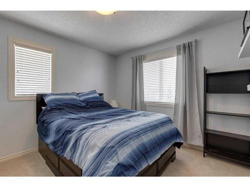 219-371 Marina Drive, Chestermere, AB - Indoor Photo Showing Bedroom