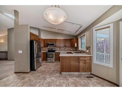 101 Arbour Cliff Close Nw, Calgary, AB - Indoor Photo Showing Kitchen