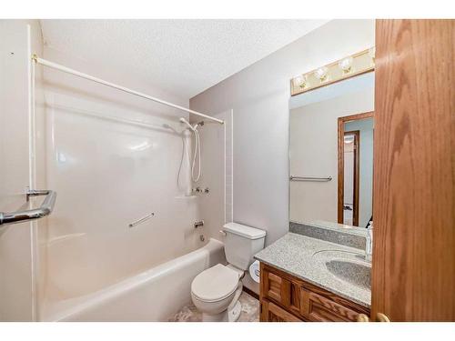 101 Arbour Cliff Close Nw, Calgary, AB - Indoor Photo Showing Bathroom