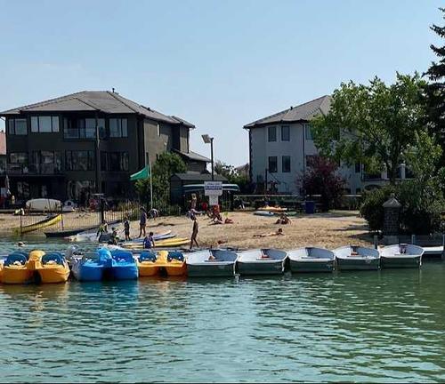 101 Arbour Cliff Close Nw, Calgary, AB - Outdoor With Body Of Water