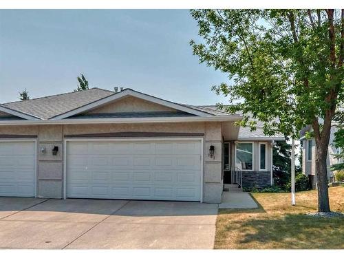 101 Arbour Cliff Close Nw, Calgary, AB - Outdoor With Facade