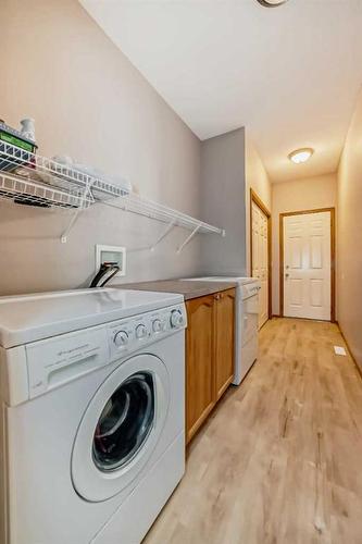 127 Invermere Close, Chestermere, AB - Indoor Photo Showing Laundry Room