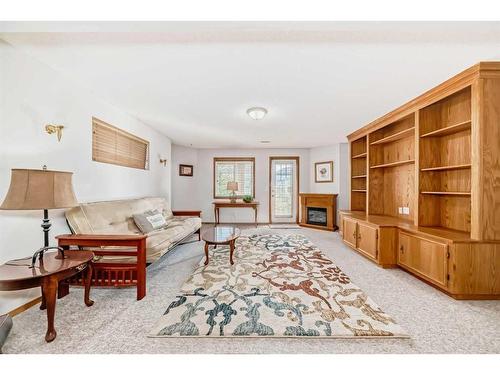 127 Invermere Close, Chestermere, AB - Indoor Photo Showing Living Room With Fireplace