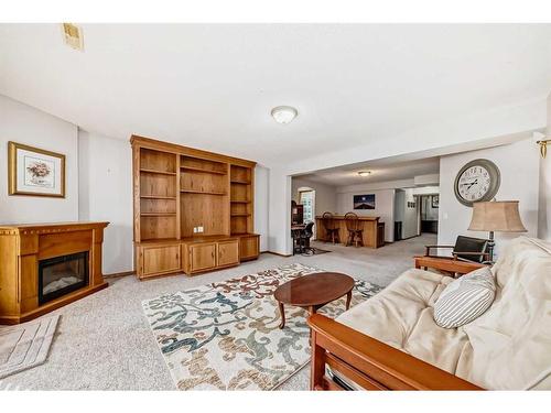 127 Invermere Close, Chestermere, AB - Indoor Photo Showing Living Room With Fireplace