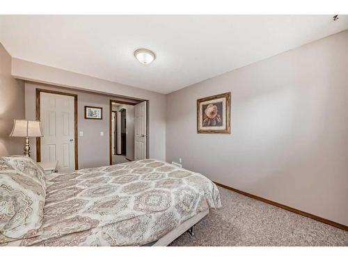 127 Invermere Close, Chestermere, AB - Indoor Photo Showing Bedroom