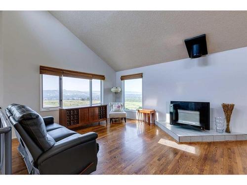 7063 Silverview Drive Nw, Calgary, AB - Indoor Photo Showing Living Room With Fireplace