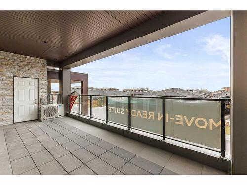 201-120 Marina Cove Se, Calgary, AB - Outdoor With Exterior