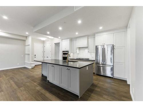 201-120 Marina Cove Se, Calgary, AB - Indoor Photo Showing Kitchen With Stainless Steel Kitchen With Upgraded Kitchen