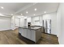 201-120 Marina Cove Se, Calgary, AB  - Indoor Photo Showing Kitchen With Stainless Steel Kitchen With Upgraded Kitchen 