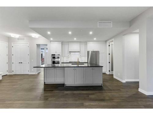 201-120 Marina Cove Se, Calgary, AB - Indoor Photo Showing Kitchen With Upgraded Kitchen