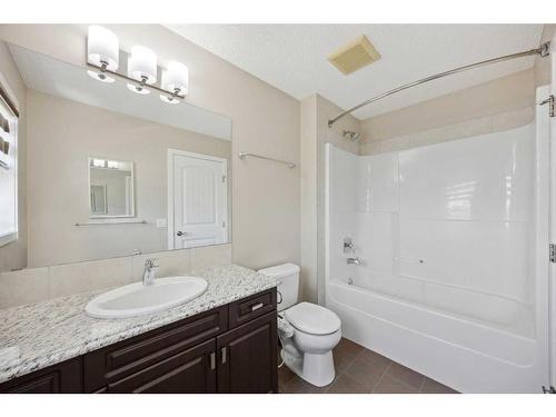 84 New Brighton Grove Se, Calgary, AB - Indoor Photo Showing Bathroom