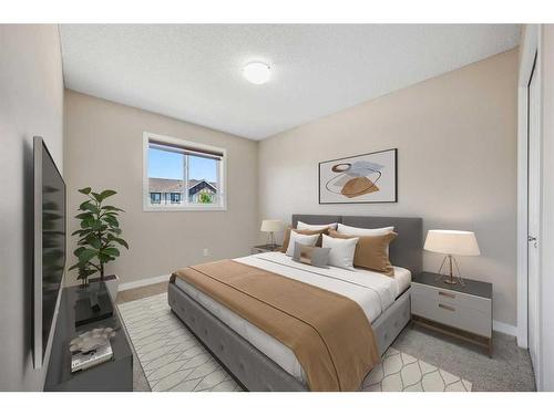 84 New Brighton Grove Se, Calgary, AB - Indoor Photo Showing Bedroom
