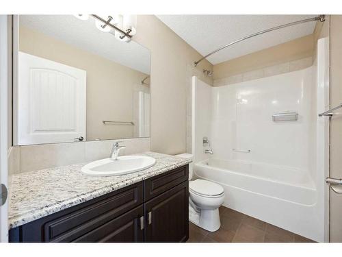 84 New Brighton Grove Se, Calgary, AB - Indoor Photo Showing Bathroom