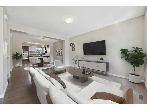 84 New Brighton Grove Se, Calgary, AB - Indoor Photo Showing Living Room
