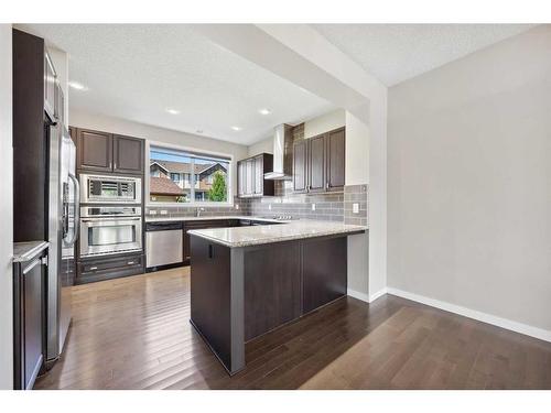 84 New Brighton Grove Se, Calgary, AB - Indoor Photo Showing Kitchen With Stainless Steel Kitchen With Upgraded Kitchen