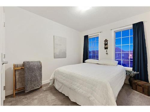 186 Coopersfield Way Sw, Airdrie, AB - Indoor Photo Showing Bedroom