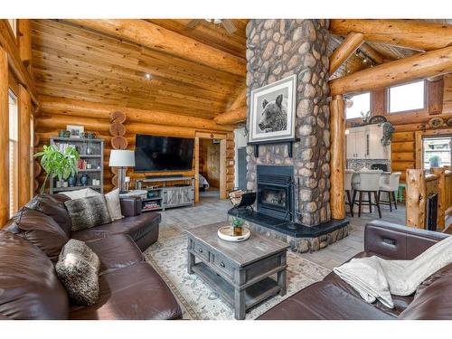 416 Ghost Lake Village Road, Ghost Lake, AB - Indoor Photo Showing Living Room With Fireplace