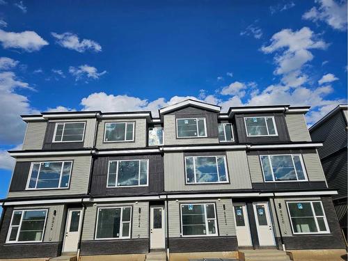 8820-8850 48 Street Ne, Calgary, AB - Outdoor With Facade