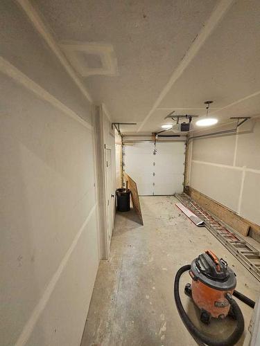 8820-8850 48 Street Ne, Calgary, AB - Indoor Photo Showing Garage