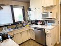 5119 Fourier Drive Se, Calgary, AB  - Indoor Photo Showing Kitchen With Double Sink 