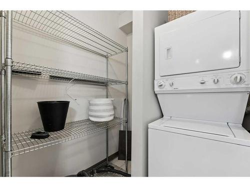 606-205 Riverfront Avenue Sw, Calgary, AB - Indoor Photo Showing Laundry Room