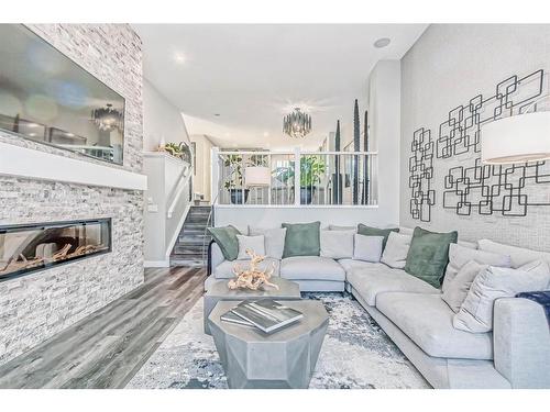 349 Masters Road Se, Calgary, AB - Indoor Photo Showing Living Room With Fireplace