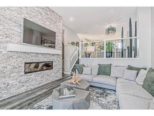 349 Masters Road Se, Calgary, AB - Indoor Photo Showing Living Room With Fireplace