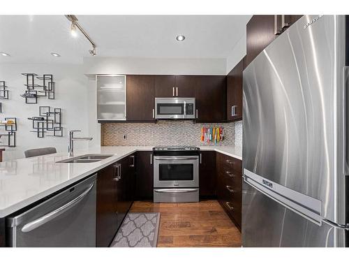 406-805 4 Street Ne, Calgary, AB - Indoor Photo Showing Kitchen With Stainless Steel Kitchen With Upgraded Kitchen