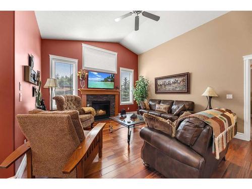 29 Vantage Crescent, Olds, AB - Indoor Photo Showing Living Room With Fireplace