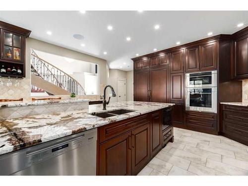 16 Wolfwillow Lane, Rural Rocky View County, AB - Indoor Photo Showing Kitchen With Double Sink With Upgraded Kitchen