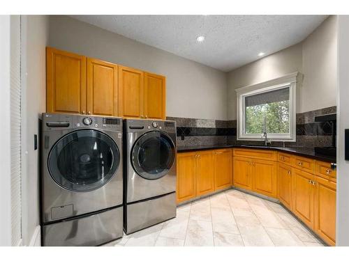 16 Wolfwillow Lane, Rural Rocky View County, AB - Indoor Photo Showing Laundry Room