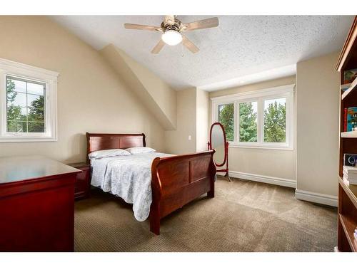 16 Wolfwillow Lane, Rural Rocky View County, AB - Indoor Photo Showing Bedroom