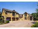 16 Wolfwillow Lane, Rural Rocky View County, AB  - Outdoor With Facade 