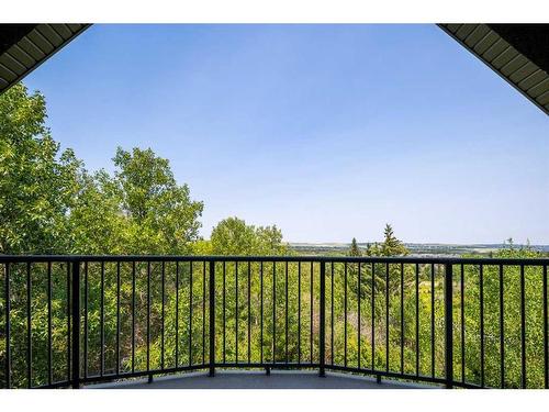 16 Wolfwillow Lane, Rural Rocky View County, AB - Outdoor With Balcony With View