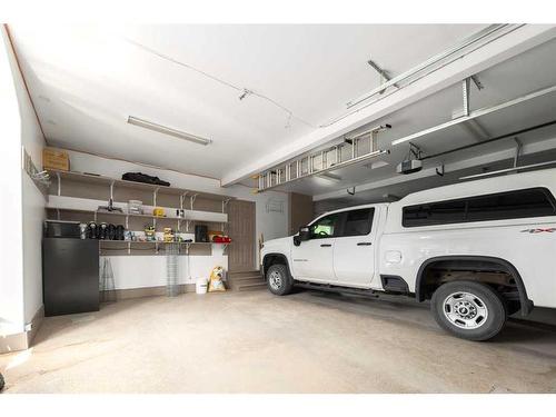 16 Wolfwillow Lane, Rural Rocky View County, AB - Indoor Photo Showing Garage