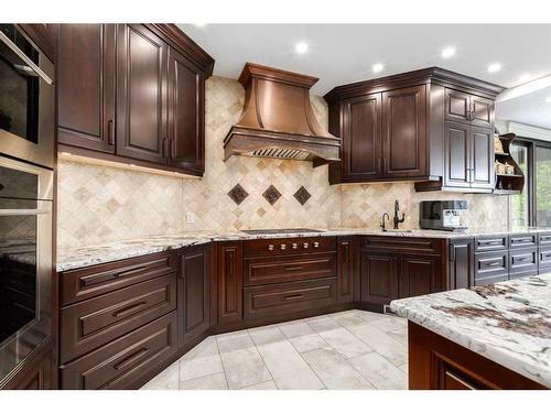 16 Wolfwillow Lane, Rural Rocky View County, AB - Indoor Photo Showing Kitchen With Upgraded Kitchen