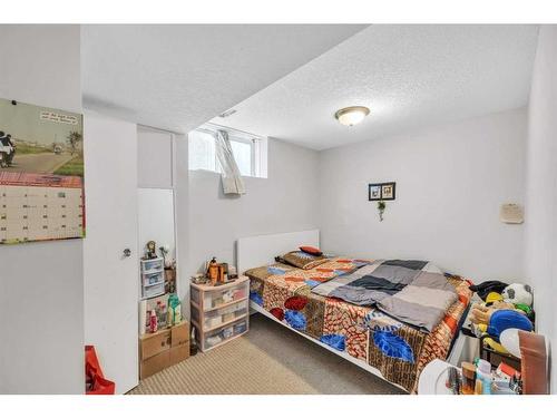 228 Martinvalley Crescent Ne, Calgary, AB - Indoor Photo Showing Bedroom