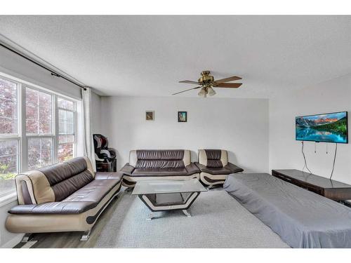 228 Martinvalley Crescent Ne, Calgary, AB - Indoor Photo Showing Living Room