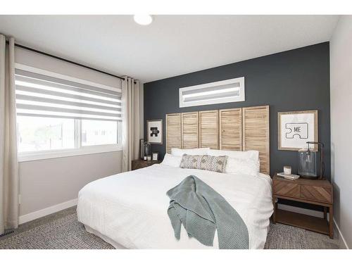 706 Wolf Willow Boulevard Se, Calgary, AB - Indoor Photo Showing Bedroom