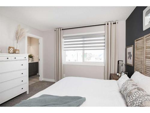 706 Wolf Willow Boulevard Se, Calgary, AB - Indoor Photo Showing Bedroom