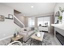 706 Wolf Willow Boulevard Se, Calgary, AB  - Indoor Photo Showing Living Room With Fireplace 