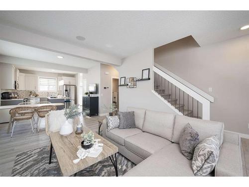 706 Wolf Willow Boulevard Se, Calgary, AB - Indoor Photo Showing Living Room With Fireplace