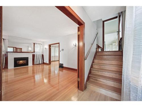 1519 32 Avenue Sw, Calgary, AB - Indoor Photo Showing Other Room With Fireplace