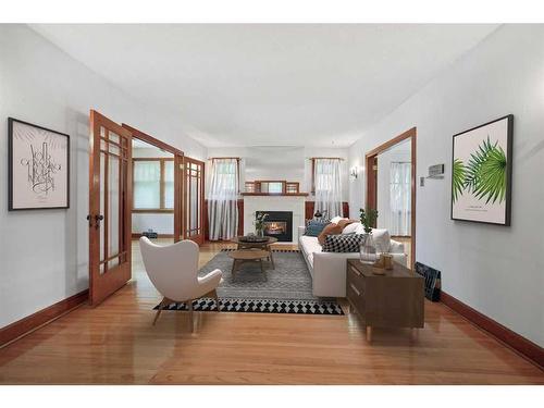 1519 32 Avenue Sw, Calgary, AB - Indoor Photo Showing Living Room With Fireplace