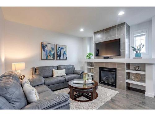 3021 Carpenter Landing Sw, Edmonton, AB - Indoor Photo Showing Living Room With Fireplace